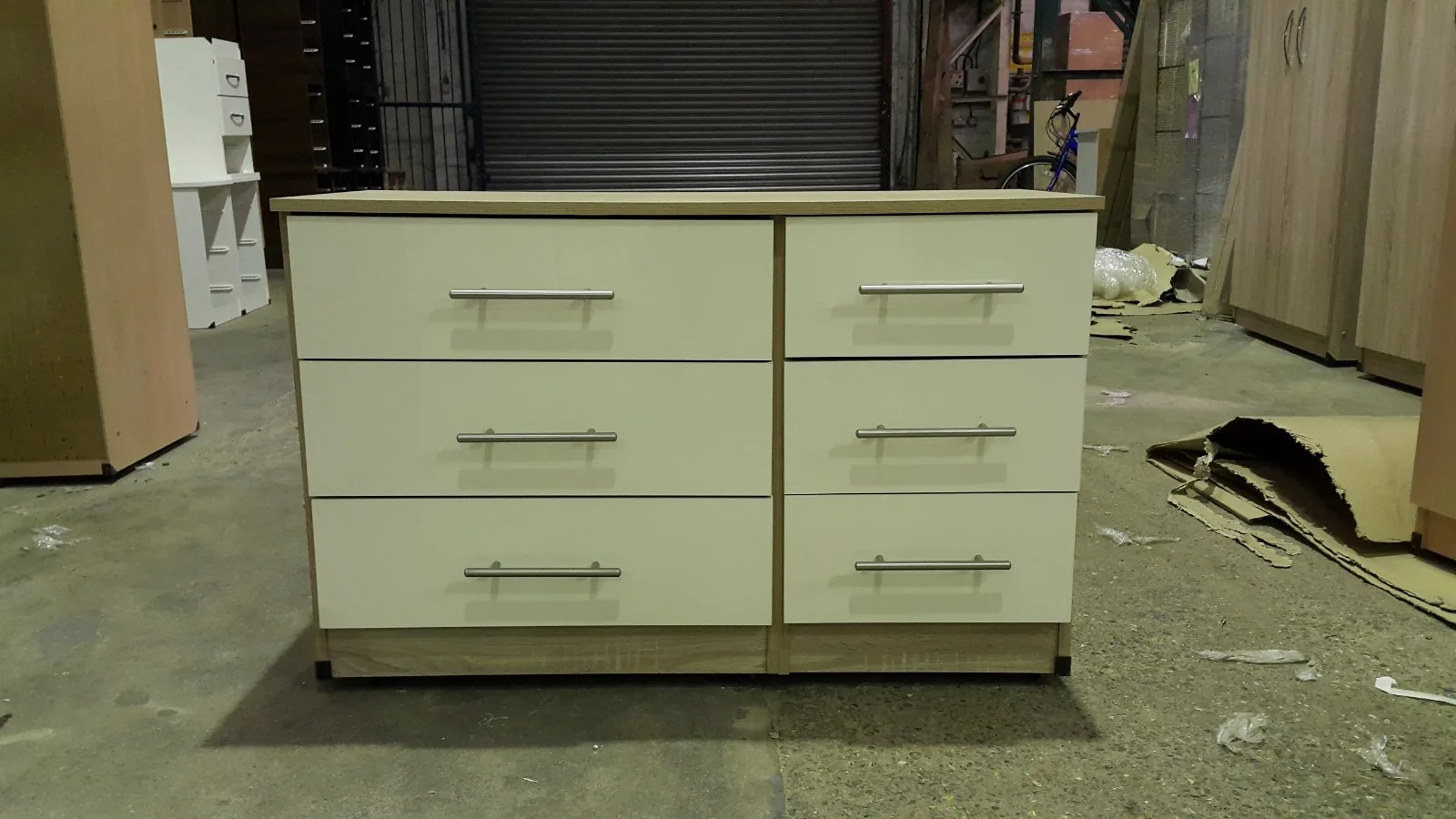 Tall chest of drawers in a contemporary grey