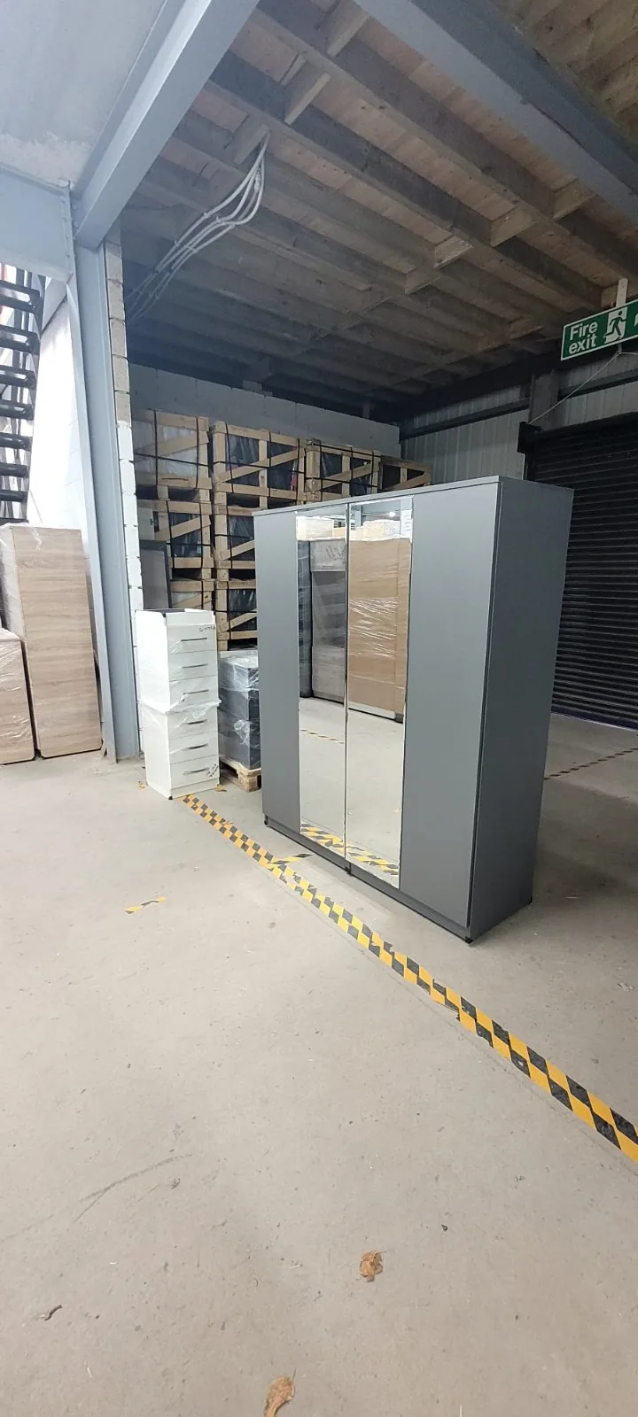 Modern wardrobe in a high-gloss white