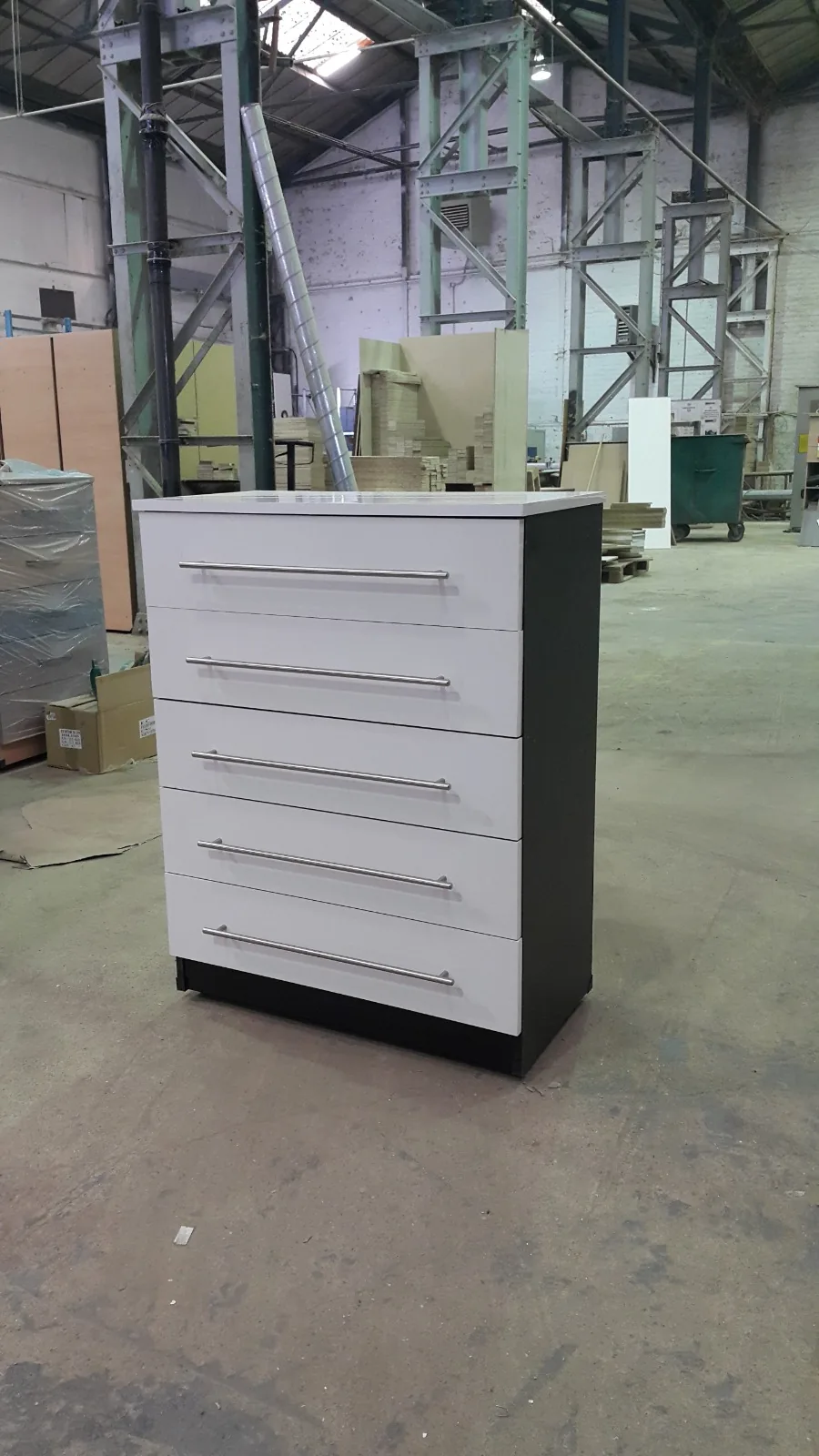Wardrobe range finished in warm wood tones