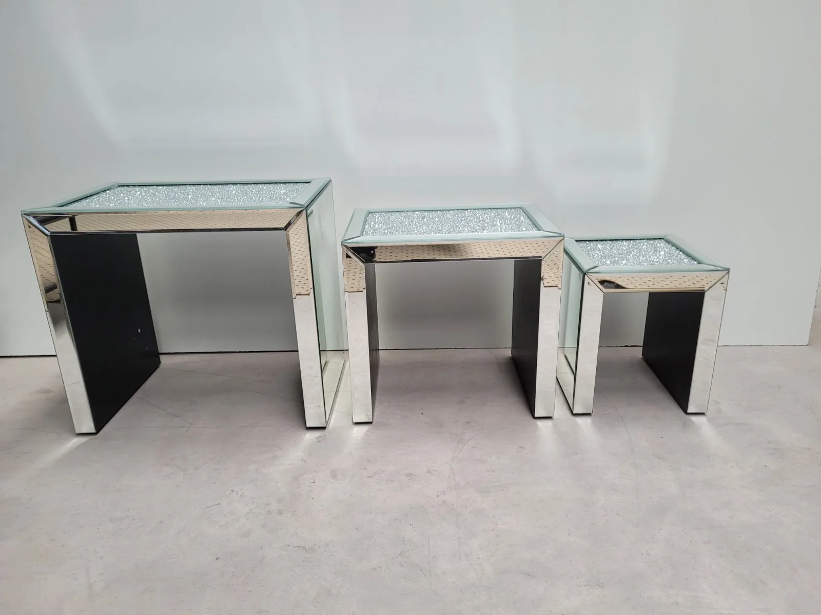 Mirrored bedroom furniture with nesting tables
